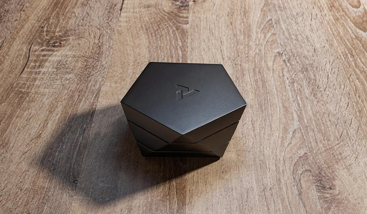 a designer ashtray with a lid that contains ashes and protects the air