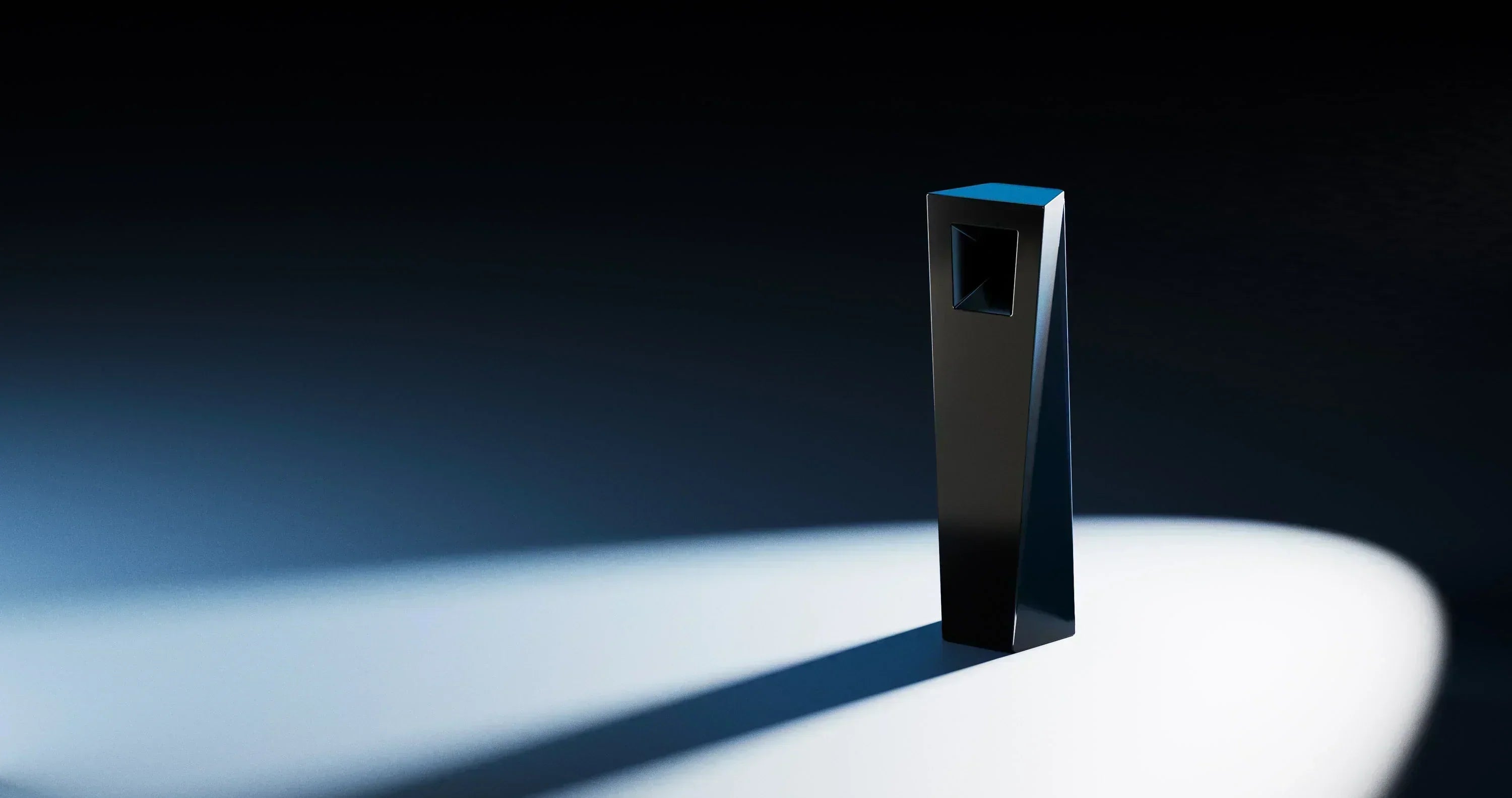 Tempest modern smoking pipe standing upright with dramatic backlight in a studio